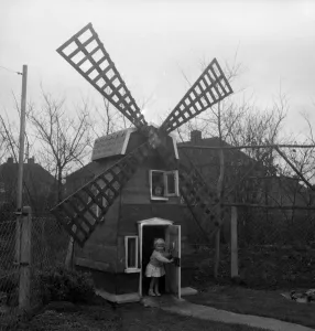 Children Prints: 1959 Print of a Windmill Playhouse in a Garden