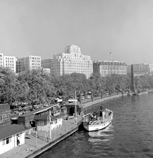 Thames River Boats with Cleopatras Needle and the Shell Mex House ( art deco style 1930 - 1931 )
