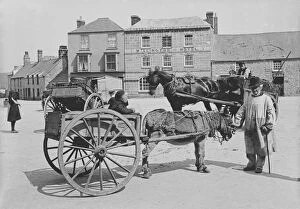 Street Collection: A donkey and cart in Market Square, St Just in Penwith, Cornwall. Early 1900s