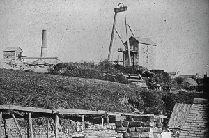 Two Engine houses at Wheal Sparnon with cottages in the background, Redruth, Cornwall Two Engine houses at Wheal Sparnon with cottages in the background, Redruth, Cornwall