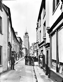 Images Dated 12th May 2016: Fore Street, looking north towards the town hall clock tower, East Looe, Cornwall. 2nd June 1904