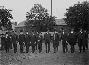 Events Collection: Gentlemen in top hats lined up on The Green, Truro, Cornwall. Early 1900s