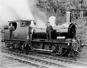Western Gallery: GWR tank number 34 pictured with four men on the St Ives branch. Around 1905