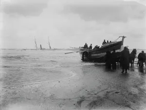The Hayle lifeboat New Oriental Bank (later renamed E.F. Harrison) with the wreck The Hayle lifeboat New Oriental Bank (later renamed E.F. Harrison) with the wreck