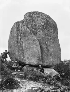 Three men by near a huge granite boulder, Luxulyan Valley, Cornwall. 1900 Three men by near a huge granite boulder, Luxulyan Valley, Cornwall. 1900