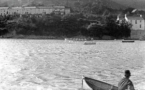 Prints of Gig being rowed at Malpas. Photographer: Unknown England Prints: Malpas Regatta Print: Early 1900s Gig Rowing Scene