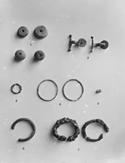 Images Dated 19th September 2019: Spindle whorls, Iron Age brooches and various rings from the Iron Age cemetery at Harlyn Bay