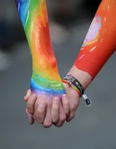 Offbeat Quirky Images Gallery: Austria-Rainbow Parade-Hand in Hand
