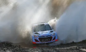 <b class=qtipBold><figcaption>Auto-Rally-Wrc-Aus</figcaption></b><br>New Zealand's Hayden Paddon powers his Hyundai through a water crossing on the final day of the World Rally Championship (WRC) Rally of Australia, near Glenreagh on the New South Wales central coast, September 14, 2014. AFP PHOTO/William WEST / AFP PHOTO / WILLIAM WEST<br><em>© Copyright Agence France-Presse (AFP) - All Rights Reserved</em> Auto-Rally-Wrc-Aus
