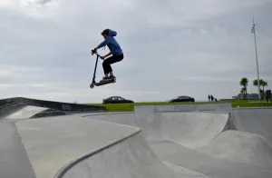 A boy rides a scooter in a skate park on October 7, 2016 in Saint-Nazaire, western France A boy rides a scooter in a skate park on October 7, 2016 in Saint-Nazaire, western France