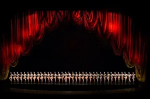 Prints of The Radio City Rockettes perform Finale in the 2016 New York Spectacular at Radio City Music Hall in New York on July 6, 2016. The show is running now through August 7, 2016. / AFP PHOTO / TIMOTHY A New York Prints: Print of the Radio City Rockettes performing Finale in 2016