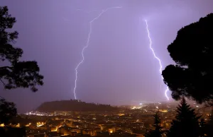 A flash of lighting lights up the sky above the Baie des Anges in Nice A flash of lighting lights up the sky above the Baie des Anges in Nice
