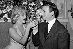 Celebrity & People Collection: Marilyn Monroe and her co-star, French actor and singer Yves Montand
