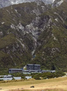 <b class=qtipBold><figcaption>Nzealand-Mt Cook</figcaption></b><br>A photo taken on Febraury 25, 2015, shows the Hermitage Hotel and the Sir Edmund Hillary Alpine Centre which sit at the foot of New Zealand's highest mountain Mt Cook - also known by it's Maori name of Aoraki - located in the Southern Alps on the South Island at a height of 3, 724 metres (12, 218 ft). AFP PHOTO / William WEST<br><em>© Copyright Agence France-Presse (AFP) - All Rights Reserved</em> Nzealand-Mt Cook