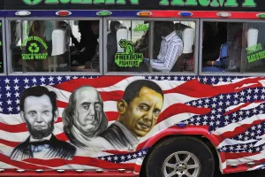 People sit in a matatu minibus with a painting depicting US Presidents Abraham Lincoln People sit in a matatu minibus with a painting depicting US Presidents Abraham Lincoln