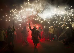 Offbeat 2015 Gallery: A reveller wearing a demon costume takes part in the traditional festival of Correfoc'