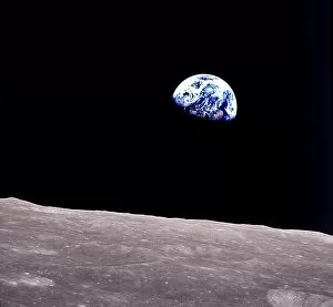 Earth Collection: Rising Earth about five degrees above the lunar horizon