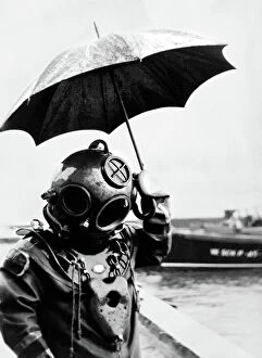 Images Dated 13th May 2016: Scuba Diver with an Umbrella