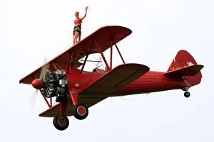 Images Dated 14th June 2009: A wing-walker prerforms on a Boeing Stearman Pt13 during the WAG 2009 (World Air