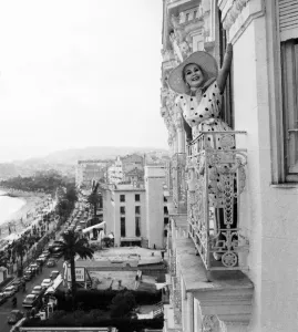 Zsa Zsa Gabor poses from the window of her apartment Zsa Zsa Gabor poses from the window of her apartment