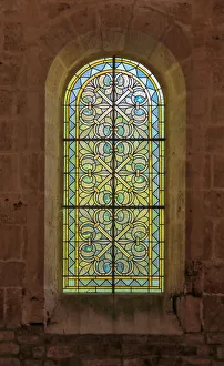 Abbey of Fontenay. Detail and stained glass of the Flat chevet of the abbey church Abbey of Fontenay. Detail and stained glass of the Flat chevet of the abbey church