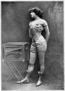 The actress Polar posing beside a barbarous organ, wearing the costume she wore in The actress Polar posing beside a barbarous organ, wearing the costume she wore in