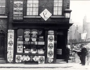 Advertising posters on a shop in North Street, Leeds, c.1895-1900 (b/w photo) Advertising posters on a shop in North Street, Leeds, c.1895-1900 (b/w photo)