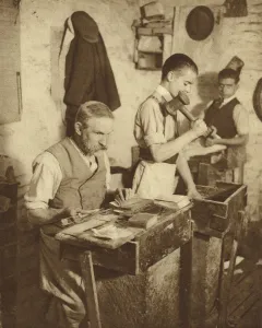 One of the most ancient crafts: gold beating in a London workshop (b/w photo) One of the most ancient crafts: gold beating in a London workshop (b/w photo)