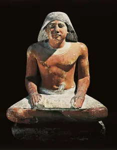 Ancient Egypt: statue of a seated scribe from the necropolis of Saqqara (Sakkara) Ancient Egypt: statue of a seated scribe from the necropolis of Saqqara (Sakkara)