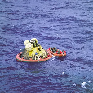 Apollo 11 crew on raft in the Pacific waiting for helicopter, 1969 (colour photograph) Apollo 11 crew on raft in the Pacific waiting for helicopter, 1969 (colour photograph)