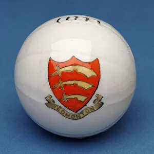 Images Dated 15th July 2008: Armorial souvenir miniature football with transfer of the Edmonton crest (ceramic)