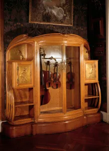 Art Nouveau: Mahogany musical instrument cabinet made by Alexandre Charpentier (1856-1909 Art Nouveau: Mahogany musical instrument cabinet made by Alexandre Charpentier (1856-1909