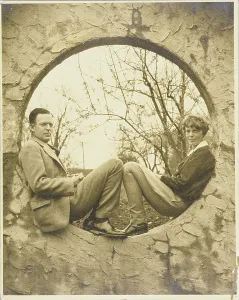 Prints of SLS251175 Amelia Earhart and George Palmer Putnam seated in a circular wall opening, c.1936 (photo) by American Photographer, (20th century); Schlesinger Library, Radcliffe Institute Pioneer Prints: Amelia Earhart and George Palmer Putnam Print, c.1936
