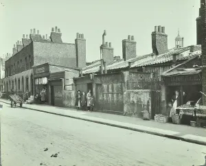 Prints of GHL1787999 Hatfield Street: exterior of slum housing, 1923 (b/w photo) by English Photographer, (20th century); London Metropolitan Archives Slums Prints: Black and white print of a 1923 London slum exterior
