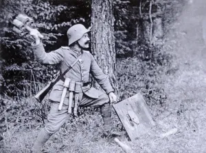 Prints of 778974 WWI German stormtroop officer demonstrating the use of cluster grenades against tanks and bunkers World War I And II Prints: WWI German Stormtroop Officer with Cluster Grenades Print