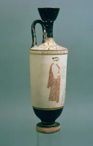 Attic white-ground lekythos decorated with a woman holding a vessel for perfume Attic white-ground lekythos decorated with a woman holding a vessel for perfume