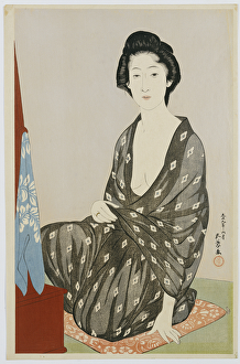 Patter Gallery: A beauty in a black kimono with white hanabishi patterns, seated before a mirror