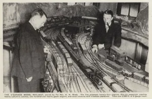 British model railway enthusiast Reverend A H Webb and his layout, 1930s (b/w photo) British model railway enthusiast Reverend A H Webb and his layout, 1930s (b/w photo)