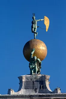 Bronze statue of Fortune at the top of the Punta della Dogana, Venice (photo)