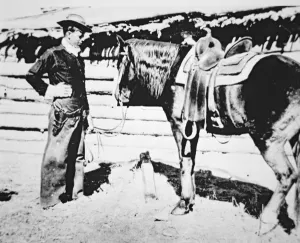 Butch Cassidy (1866-1908/09) with his horse (b/w photo) Butch Cassidy (1866-1908/09) with his horse (b/w photo)