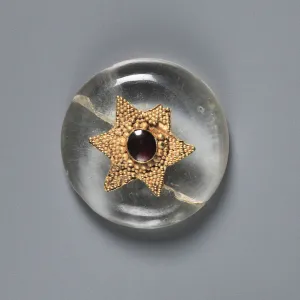 Button, 500s (rock crystal with a garnet mounted in a gold granulated star) Button, 500s (rock crystal with a garnet mounted in a gold granulated star)