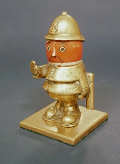 Car mascot with moveable china head, c.1912 (bronze)