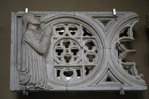 Carved rose/ wheel transenna with the donor Francesco de Felici (stone) Carved rose/ wheel transenna with the donor Francesco de Felici (stone)
