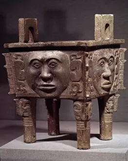 Chinese art: Fang-Ting cooking vase with faces. Chang period. 16th-11th century BC Chinese art: Fang-Ting cooking vase with faces. Chang period. 16th-11th century BC