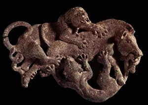 Chinese art: ornamental plaque depicting a boar attacked by two tigers Chinese art: ornamental plaque depicting a boar attacked by two tigers