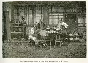The craftsmen of a cloisonne workshop in Pekin. Engraving after a photograph of M