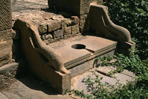 Timgad Collection: Dolphin armest public toilet of the forum; High Imperial Period (27 BC-395 AD) (stone)