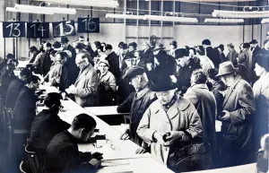 East German citizens queuing to obtain permits to visit relatives in the West (b/w photo) East German citizens queuing to obtain permits to visit relatives in the West (b/w photo)