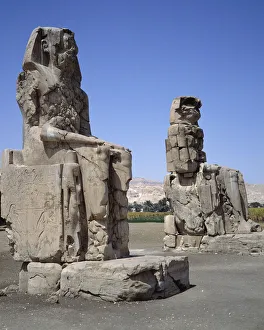 Egyptian antiquite: view of the Colossus of Memnon, period Amenophis III, new empire Egyptian antiquite: view of the Colossus of Memnon, period Amenophis III, new empire