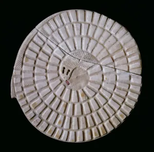 Egyptian snake shaped gaming board, used for the serpent game Mehen Egyptian snake shaped gaming board, used for the serpent game Mehen